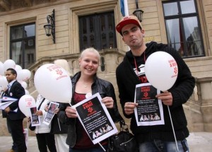 People holding flyer